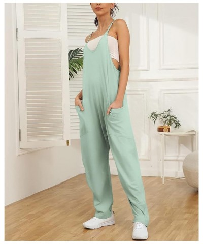 Jumpsuits for Women Sleeveless Summer Loose Rompers Adjustable Spaghetti Straps Baggy Overalls Jumpers with Pockets Cyan $10....